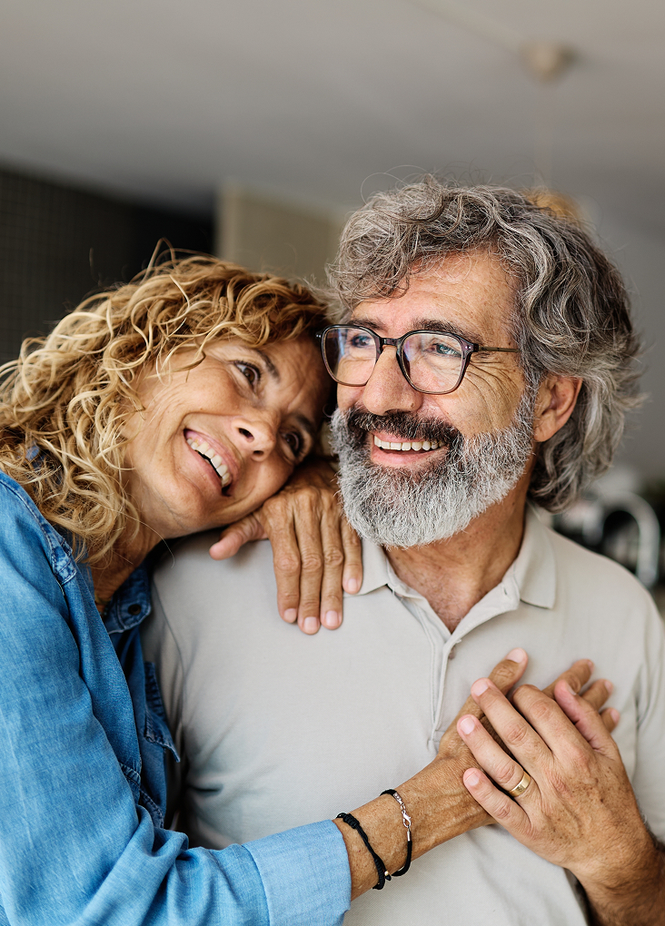 A smiling couple at home